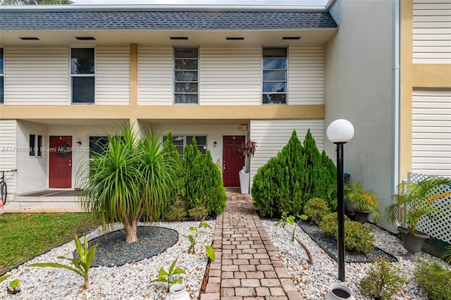 view of front of house featuring stucco siding