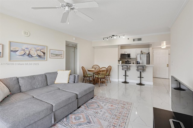 2665 SW 37th Ave Unit 612, Miami, FL 33133 - living area featuring light marble finish floors, ornamental molding, and ceiling fan