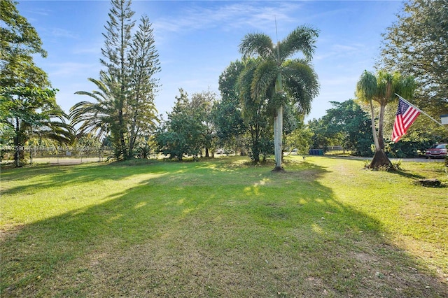 view of yard with fence