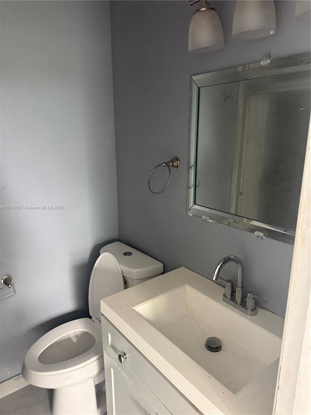 half bath with toilet and vanity