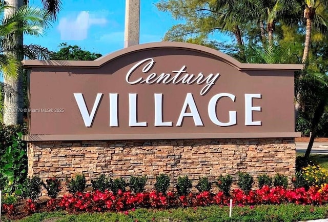 view of community sign