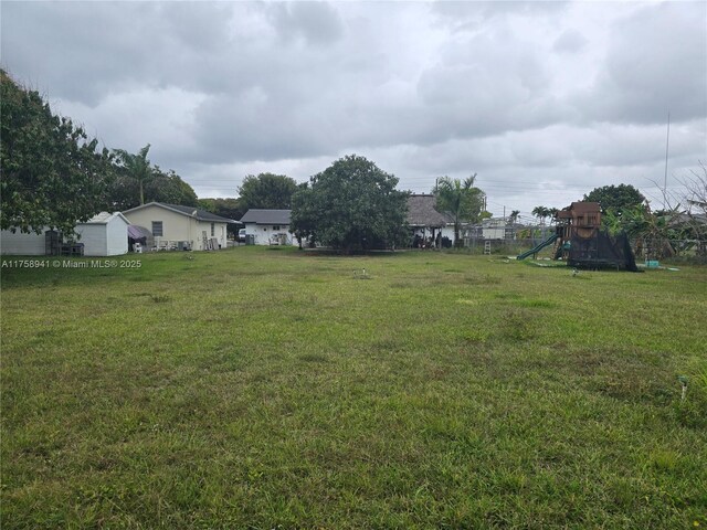 17890 SW 264th St, Homestead, FL 33031 - view of grassy yard with a playground