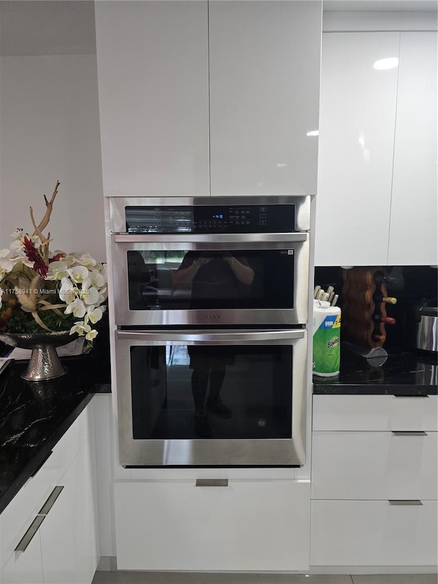 17890 SW 264th St, Homestead, FL 33031 - kitchen view of modern cabinets, white cabinets, dark countertops, and double oven