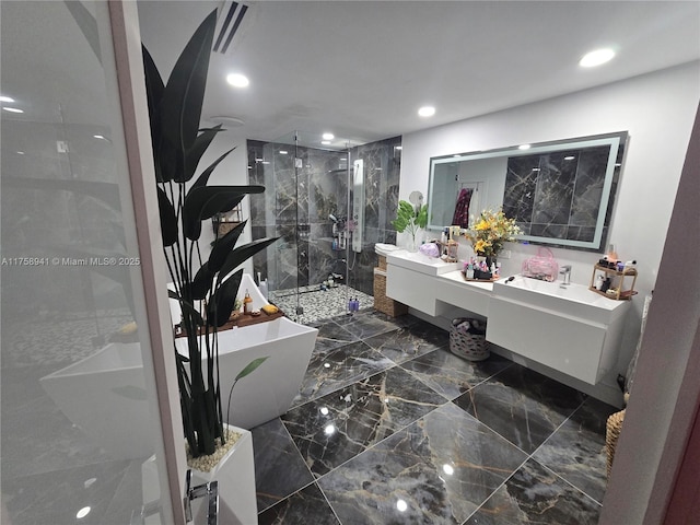 17890 SW 264th St, Homestead, FL 33031 - bathroom featuring a shower stall, marble tiled flooring, recessed lighting, double vanity, and a freestanding tub