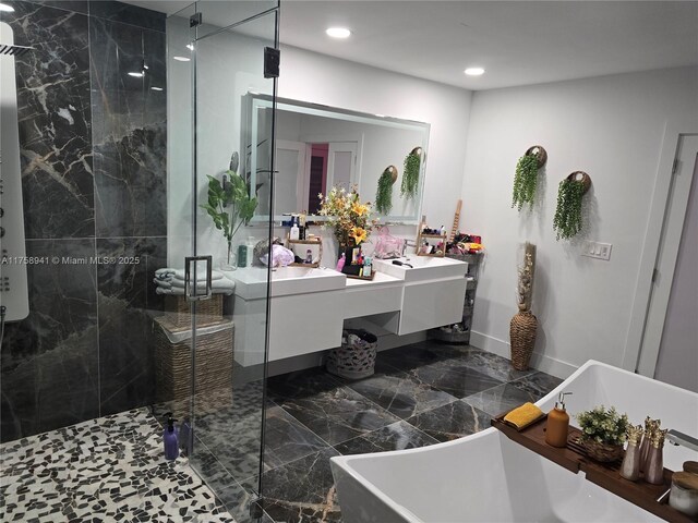 17890 SW 264th St, Homestead, FL 33031 - full bath with a stall shower, a freestanding bath, marble finish floors, recessed lighting, and double vanity