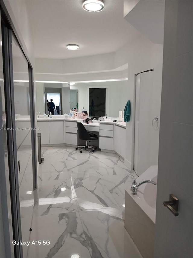 office area featuring marble finish floor