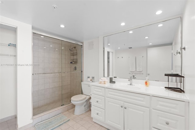 full bath with tile patterned flooring, toilet, recessed lighting, vanity, and a shower stall