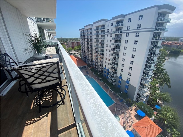 balcony featuring a water view