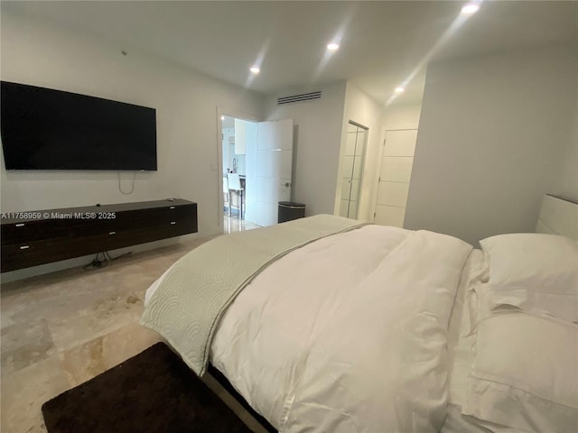 bedroom with visible vents and recessed lighting