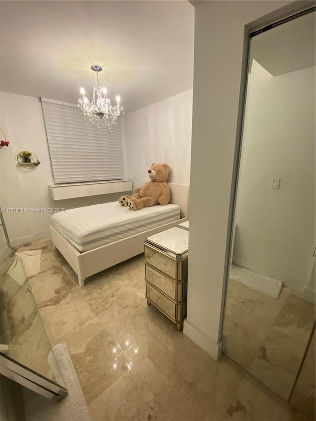 bedroom featuring baseboards, marble finish floor, and an inviting chandelier