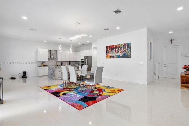 dining area with baseboards, visible vents, recessed lighting, and light tile patterned floors