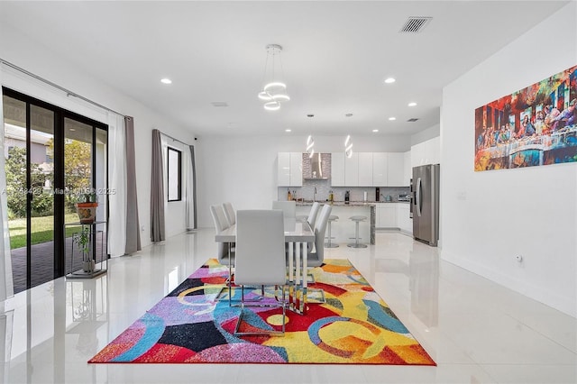 dining room featuring french doors, recessed lighting, and visible vents