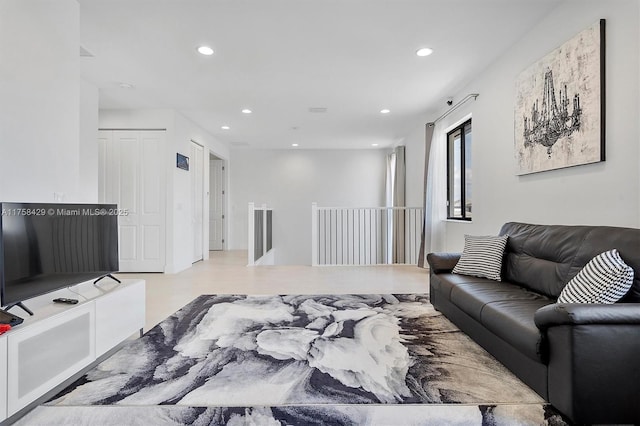 living area featuring recessed lighting