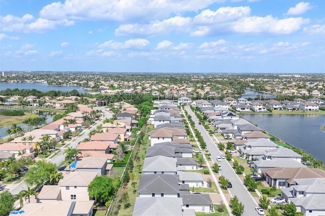 aerial view featuring a water view and a residential view