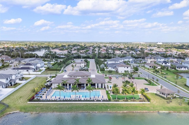 aerial view featuring a residential view and a water view