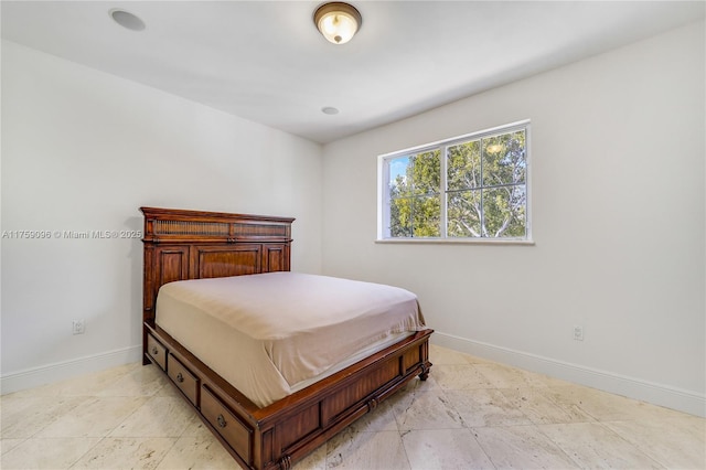 bedroom with baseboards