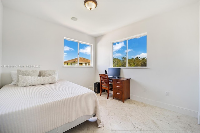 bedroom with baseboards