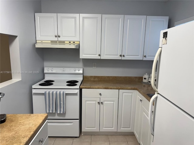 kitchen featuring white appliances, under cabinet range hood, white cabinets, and light tile patterned flooring