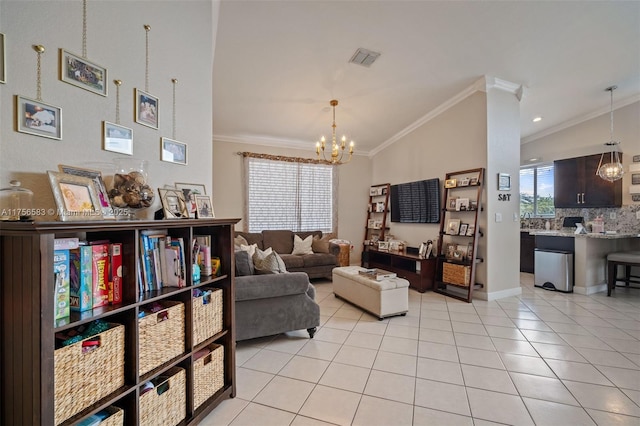 living room with visible vents, vaulted ceiling, crown molding, a notable chandelier, and light tile patterned flooring