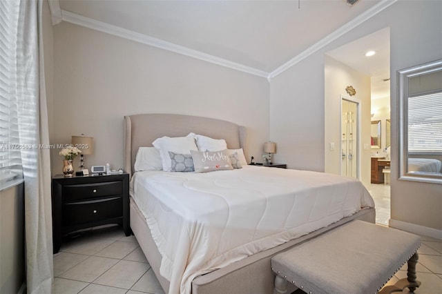 bedroom with light tile patterned floors, baseboards, visible vents, ornamental molding, and ensuite bathroom