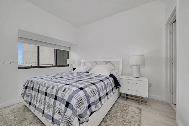 480 NE 31st St Unit 4805, Miami, FL 33137 - bedroom with baseboards and wood finished floors