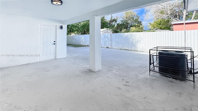 view of patio / terrace featuring central AC unit and a fenced backyard