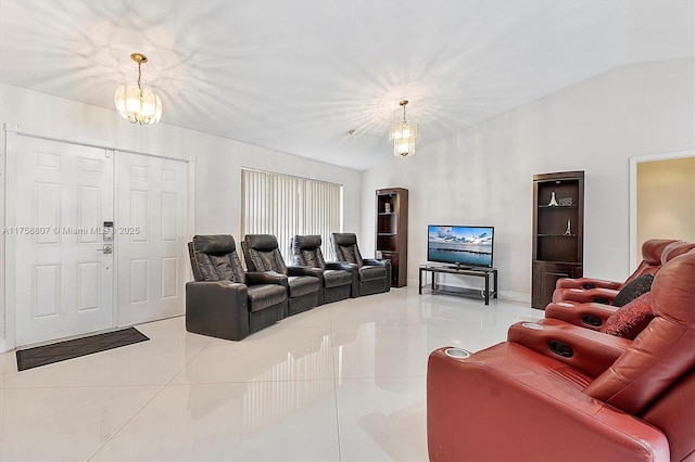 living area featuring vaulted ceiling, light tile patterned floors, and a notable chandelier