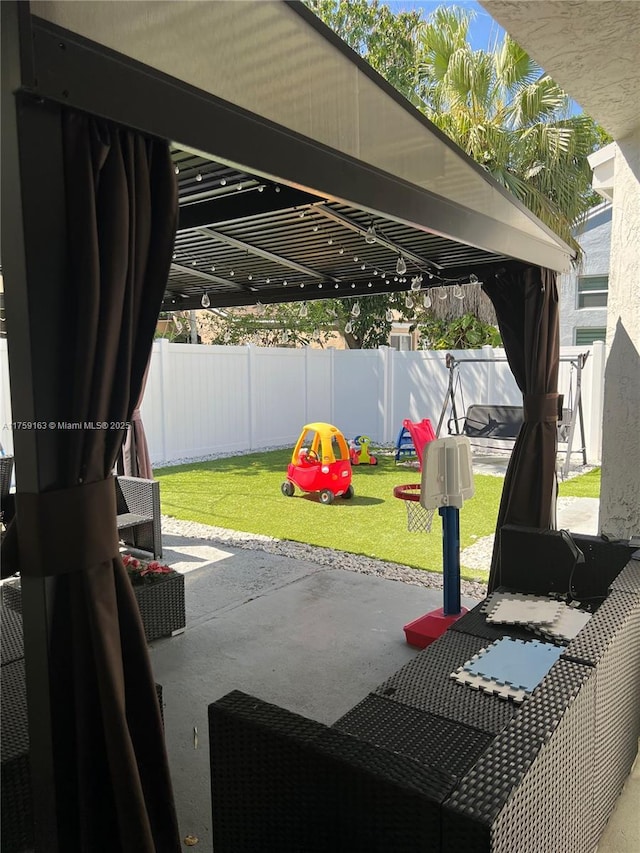 view of patio with a fenced backyard