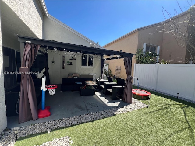 view of patio / terrace with outdoor lounge area and fence