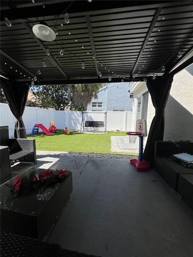 view of patio with a fenced backyard