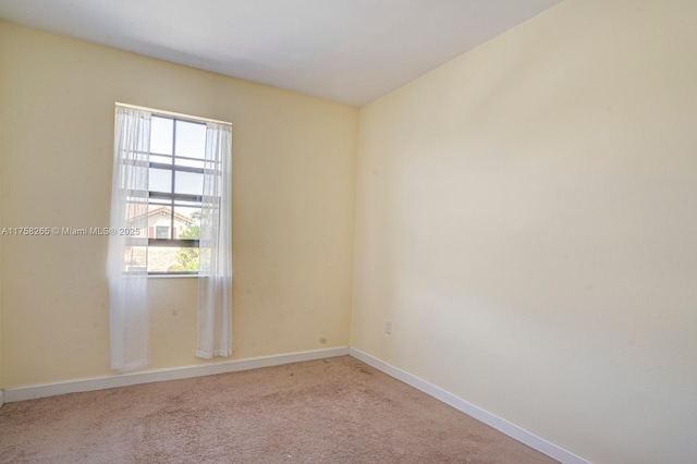 9399 W 33rd Ln # 1, Hialeah, FL 33018 - carpeted spare room featuring baseboards