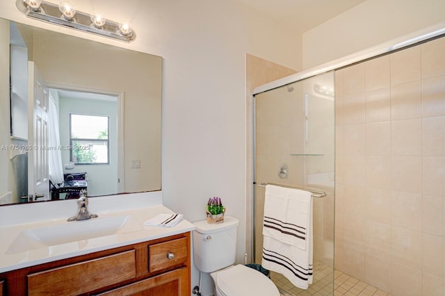 9399 W 33rd Ln # 1, Hialeah, FL 33018 - bathroom with vanity, toilet, and a stall shower