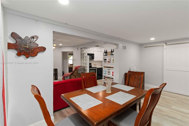 400 S 62nd Ter, Hollywood, FL 33023 - dining room featuring a barn door, recessed lighting, visible vents, baseboards, and light wood-type flooring