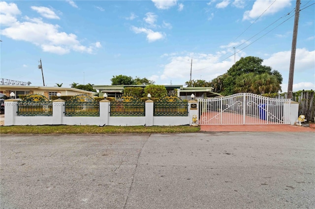 400 S 62nd Ter, Hollywood, FL 33023 - view of gate with a fenced front yard