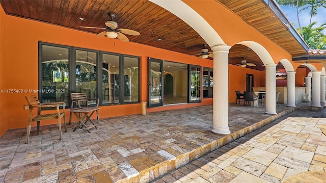 view of patio / terrace featuring outdoor dining area and a ceiling fan