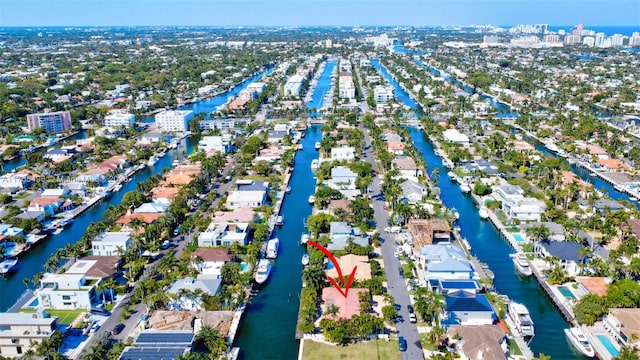 aerial view with a residential view and a water view