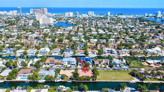 drone / aerial view featuring a water view