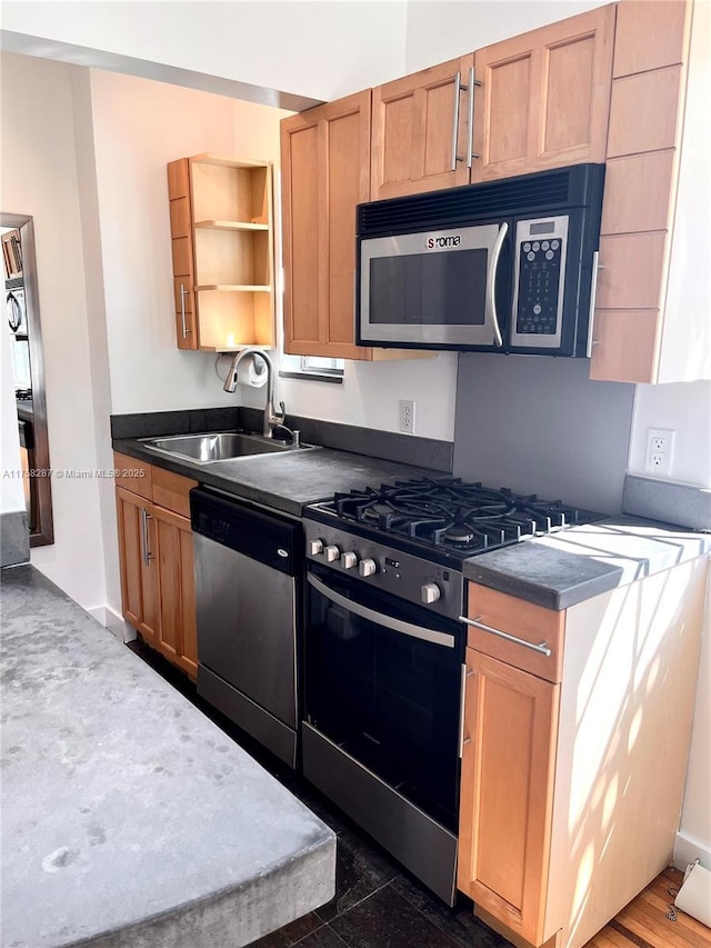 kitchen with open shelves, appliances with stainless steel finishes, dark countertops, and a sink