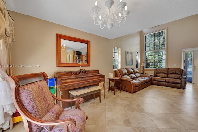 living room featuring an inviting chandelier and light tile patterned floors