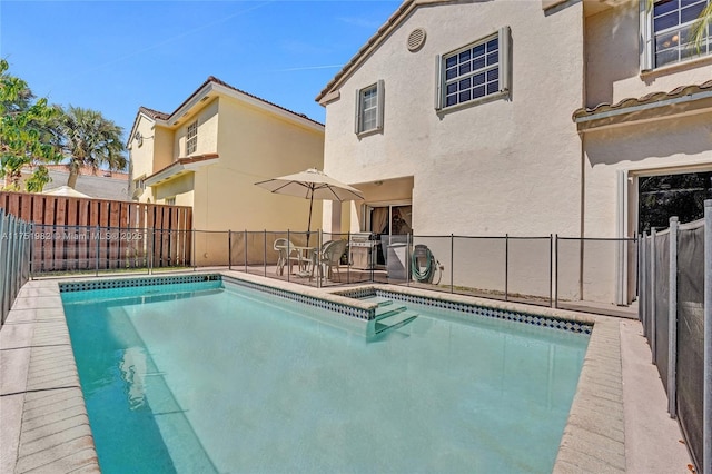 view of pool featuring a fenced in pool and a fenced backyard