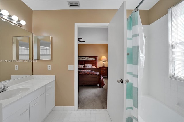 full bath featuring tile patterned floors, ensuite bath, visible vents, and vanity