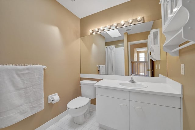 bathroom featuring tile patterned flooring, toilet, visible vents, vanity, and baseboards