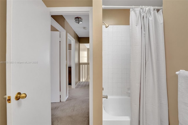 full bathroom featuring shower / bathtub combination with curtain