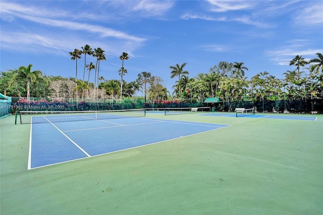 view of sport court with fence