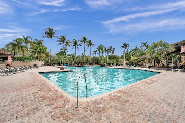 community pool featuring a patio area