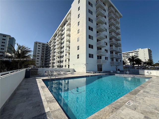 community pool featuring a patio