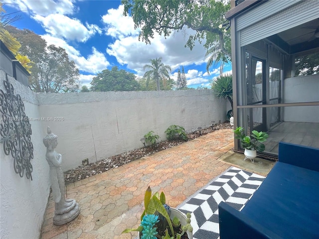 7100 NW 17th St Unit 111, Plantation, FL 33313 - view of patio / terrace with a fenced backyard
