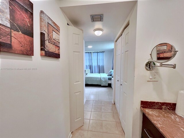 7100 NW 17th St Unit 111, Plantation, FL 33313 - hall featuring light tile patterned floors