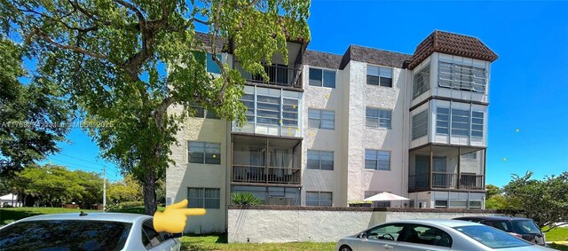 7100 NW 17th St Unit 111, Plantation, FL 33313 - view of apartment building / complex