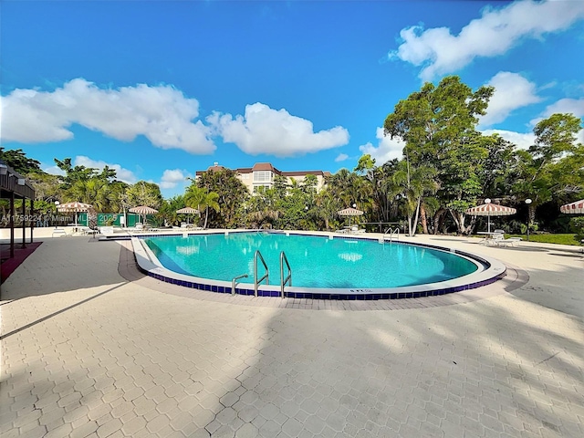 7100 NW 17th St Unit 111, Plantation, FL 33313 - community pool featuring a patio